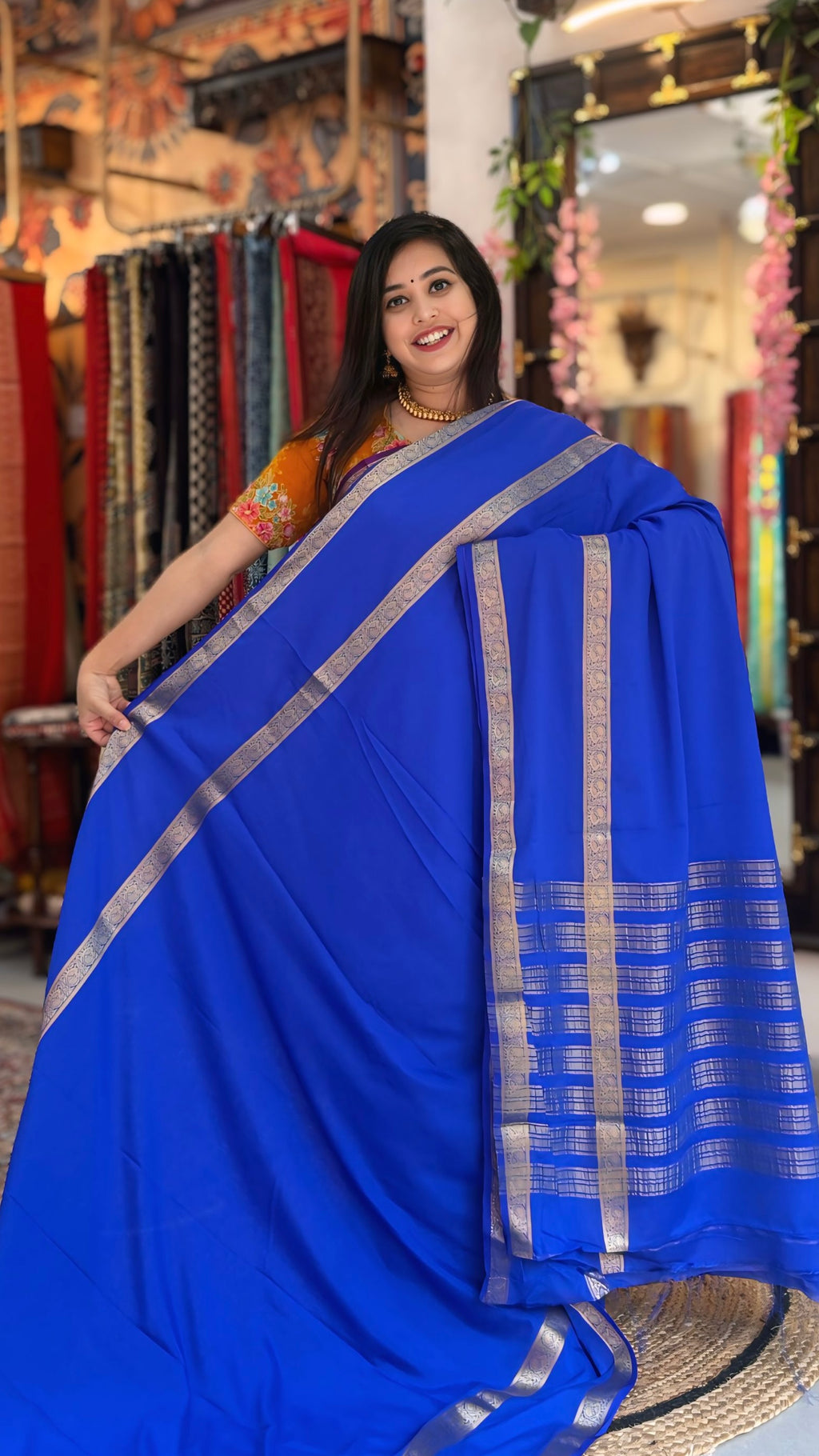 Madhuja
– Crepe Silk Saree