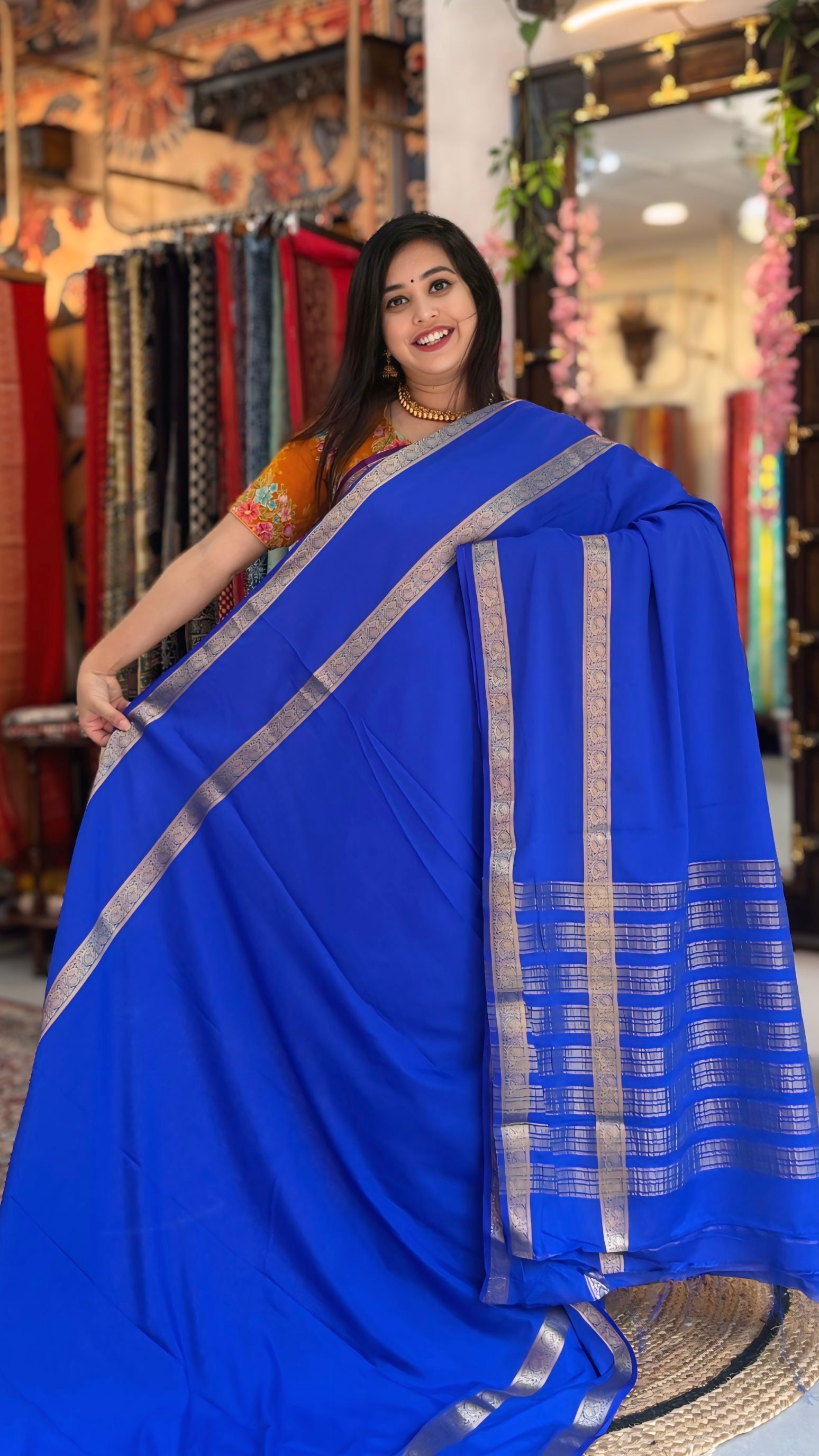 Madhuja
– Crepe Silk Saree