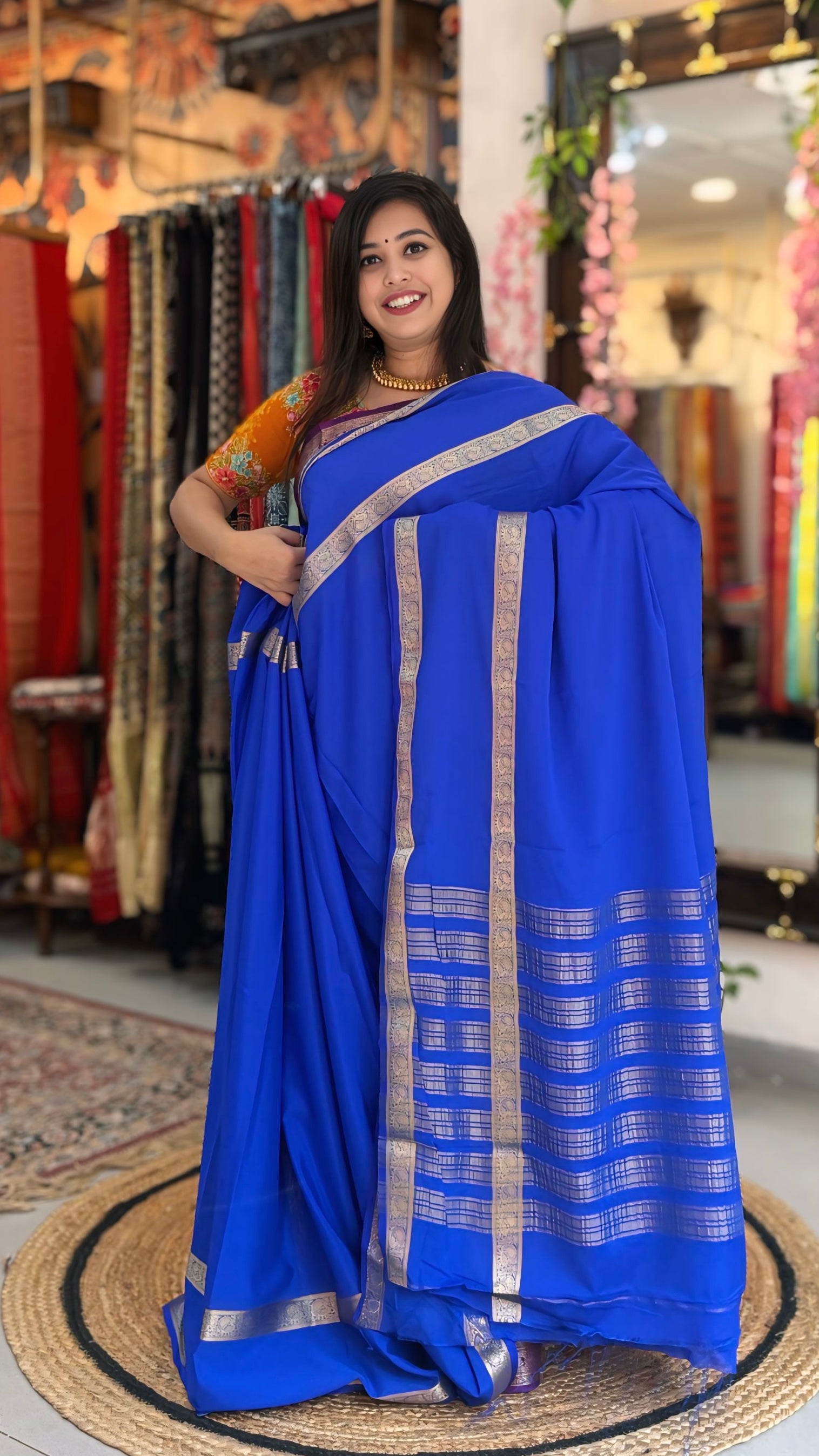 Madhuja
– Crepe Silk Saree